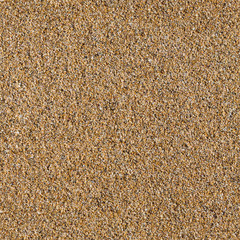Seamless texture of yellow sea sand.