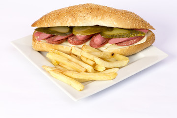 Cheeseburger and fries on restaurant table