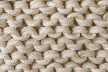 ベージュのニットの編み目