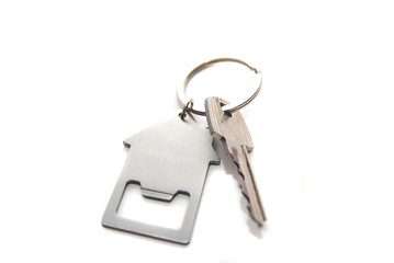Apartment house key isolated on white background