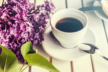White coffee cup with donats at the morning breakfast