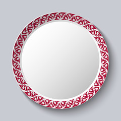 Circular ornament frame applied to a decorative porcelain plate.