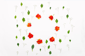Creative flowers composition. Frame made of roses and leaves. Copy space, flatlay, top view, square. Concept of spring
