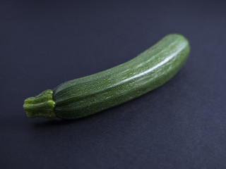Zucchini isolated on black background