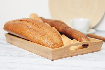 baguette in a tray, a loaf