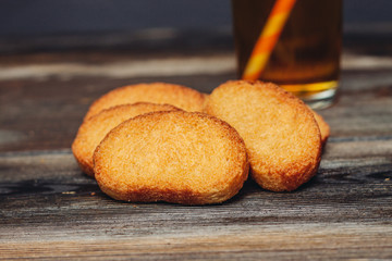 gingerbread on the table and drink in a glass