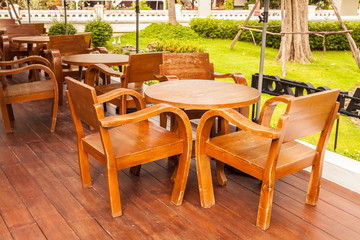 Fototapeta na wymiar Set of wooden table and chairs