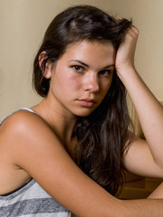 Fototapeta premium Portrait of a teenage girl with tears in her eyes 