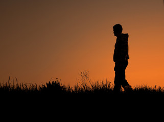 Silhouette off a man walking