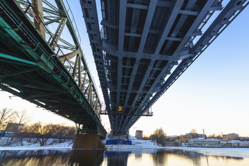 Fototapeta premium Steel railroad bridge at sundown 