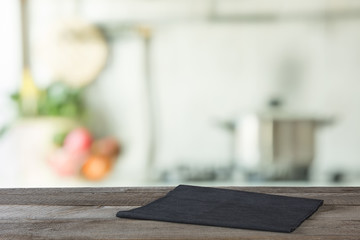 Blurred background. Modern kitchen with tabletop and space for you.