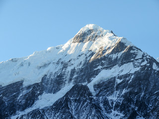 Fototapeta na wymiar Snow Covered Mountain Peak