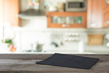 Blurred background. Modern kitchen with tabletop and space for you.