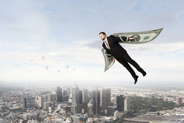 Business concept money is freedom . Mixed media © Sergey Nivens