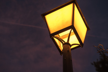 Fototapeta na wymiar Standard lamp on at night
