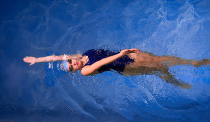 Young woman swimmer