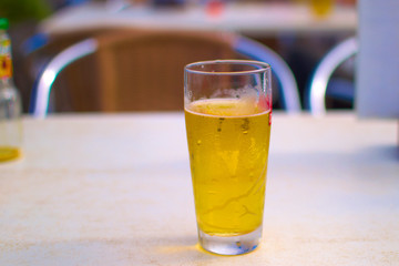 A full glass of cold beer on a hot day, alcohol, drink