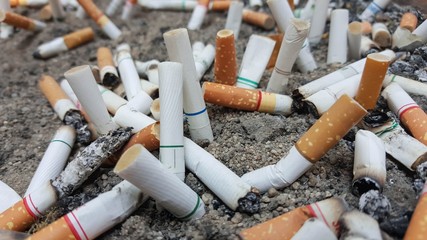 closeup Cigarette butts, Cigarette butts in the sand