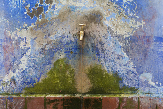 Running tap in public fountain;Chefchaouen morocco