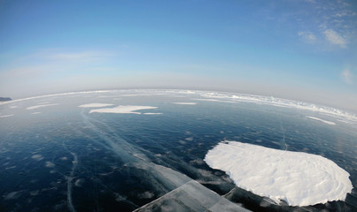 Picture taken by the action camera. Fish-eye lens. Panorama of the frozen ice of Lake Baikal Photo toned