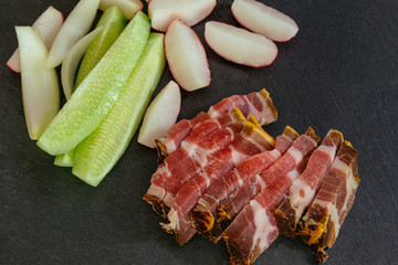 Bacon, fresh vegetables, Village breakfast concept.