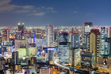 Osaka city business downtown with twiligh sky background, Japan