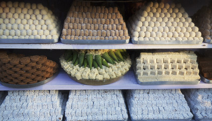 Display of Indian sweets in a sweetshop in the bazaar