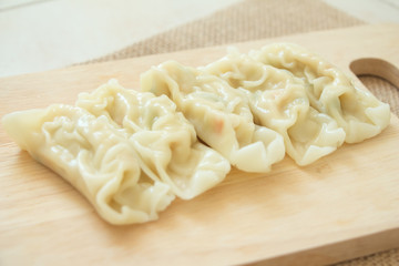 Gyoza dumplings on wood.