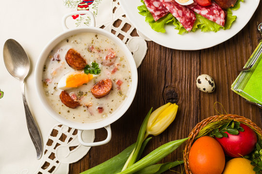 Traditional Polish white borsch with Easter decoration