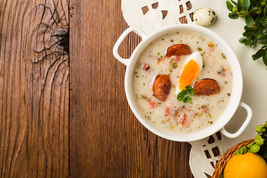 Traditional Polish white borsch with Easter decoration