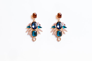 metal earrings with colored stones