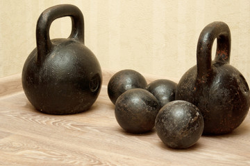 Naklejka na ściany i meble Old dumbbells and weights at the gym