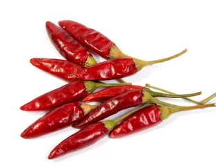 Fotobehang Dried red chili or chilli cayenne pepper isolated on white background cutout © allaordatiy