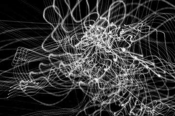 Black background with light design. Playing with black and white colour. the drawing looks like net, cobweb, tangled snarled thread, strand, silk, fibre or everything. It is about imagination. Nice 