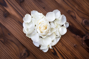 heart prom white roses on wooden background