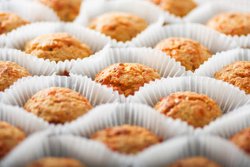  Homemade cheese muffins in paper cupcake cases. Shallow focus. close-up