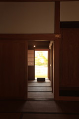 Glance of courtyard through Japanese-style living room