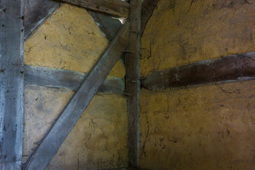 Old adobe wall of the half timbered house