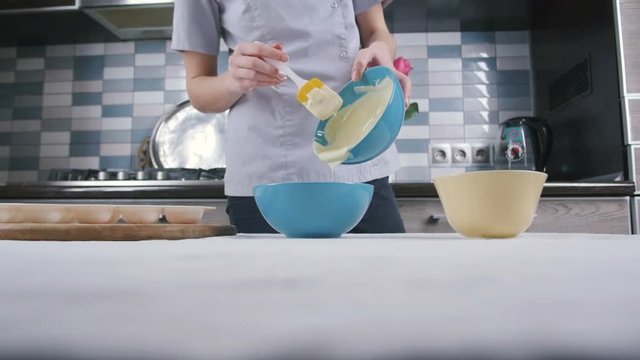 The process of preparing cake in form of heart, slow motion