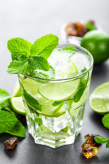Mojito Cubano or caipirinha cocktail, iced drink with lime and mint