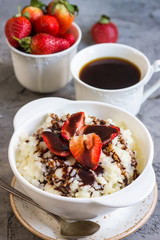 Milk rice porridge with strawberry