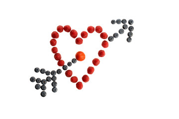 Fresh berries lying in a heart shape isolated in white