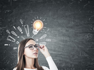 Girl in glasses, light bulb, exclamation marks