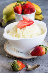 Milk rice porridge with strawberry