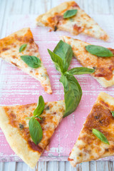 Pizza Margarita with tomatoes and cheese
