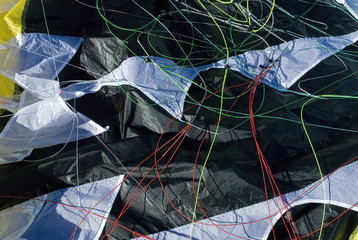 detail of kite used to make kiting (Snowkite), cables, fabric and bridle, Alps, Italy