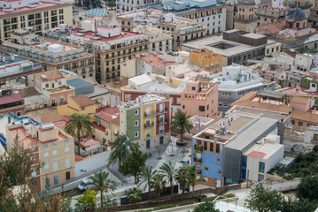 Fototapeta na wymiar A panoramic view over the roofs at the center of Alicante, Spain.