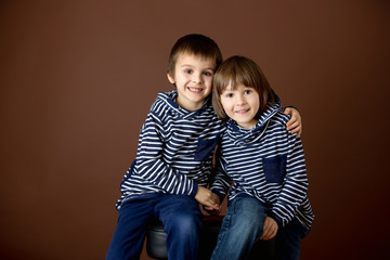 Double portrait of two boys, brothers