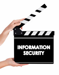Hands holding a clapper board with INFORMATION SECURITY text