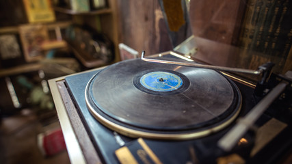 Antique dust and rust black music disc in vintage style picture.